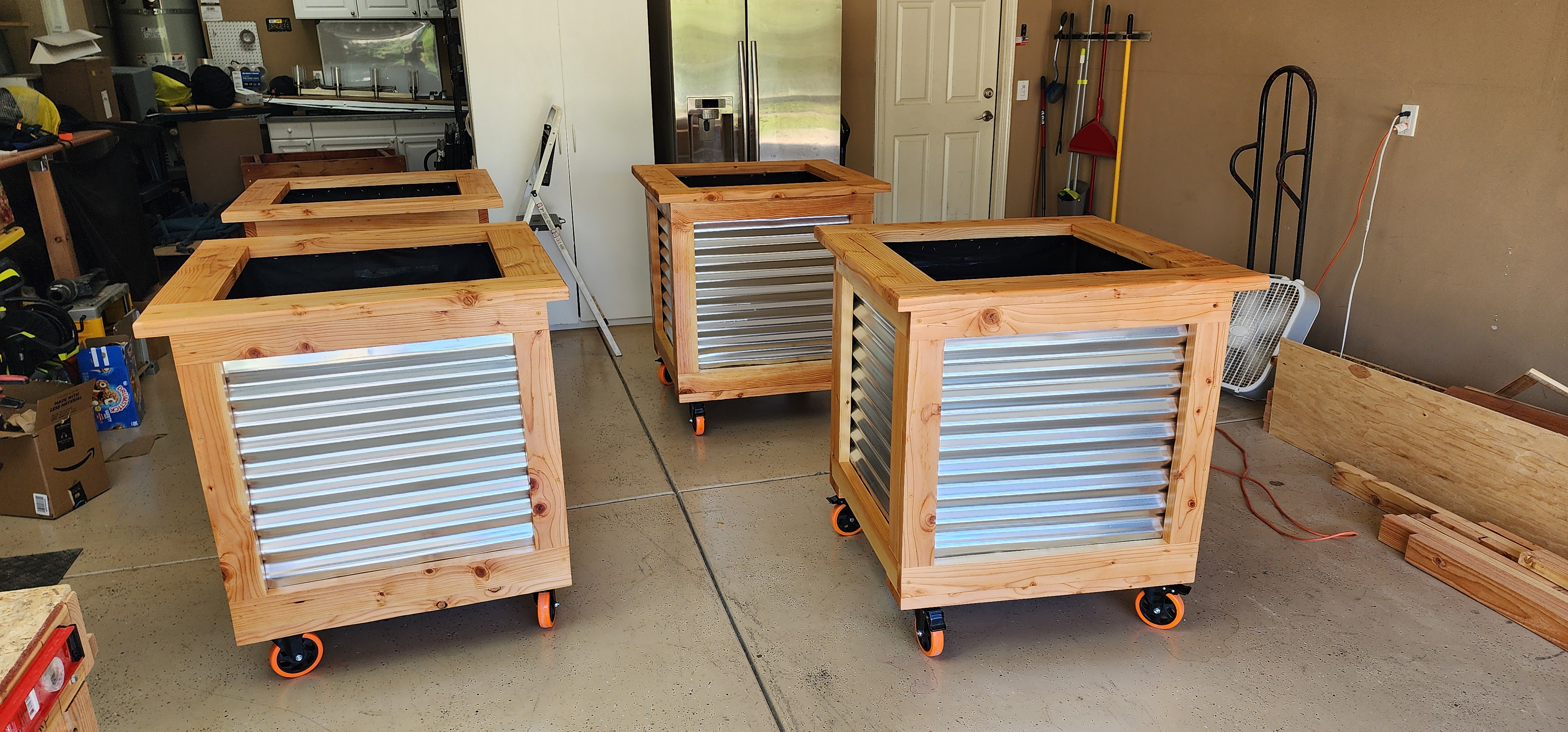 Shop shot of tall planters under construction